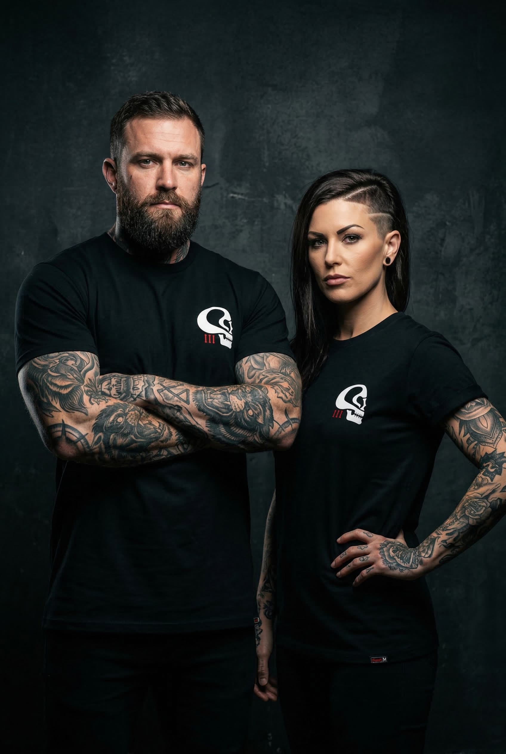 Plague Doctor Tee — Male & Female Models Front View Studio